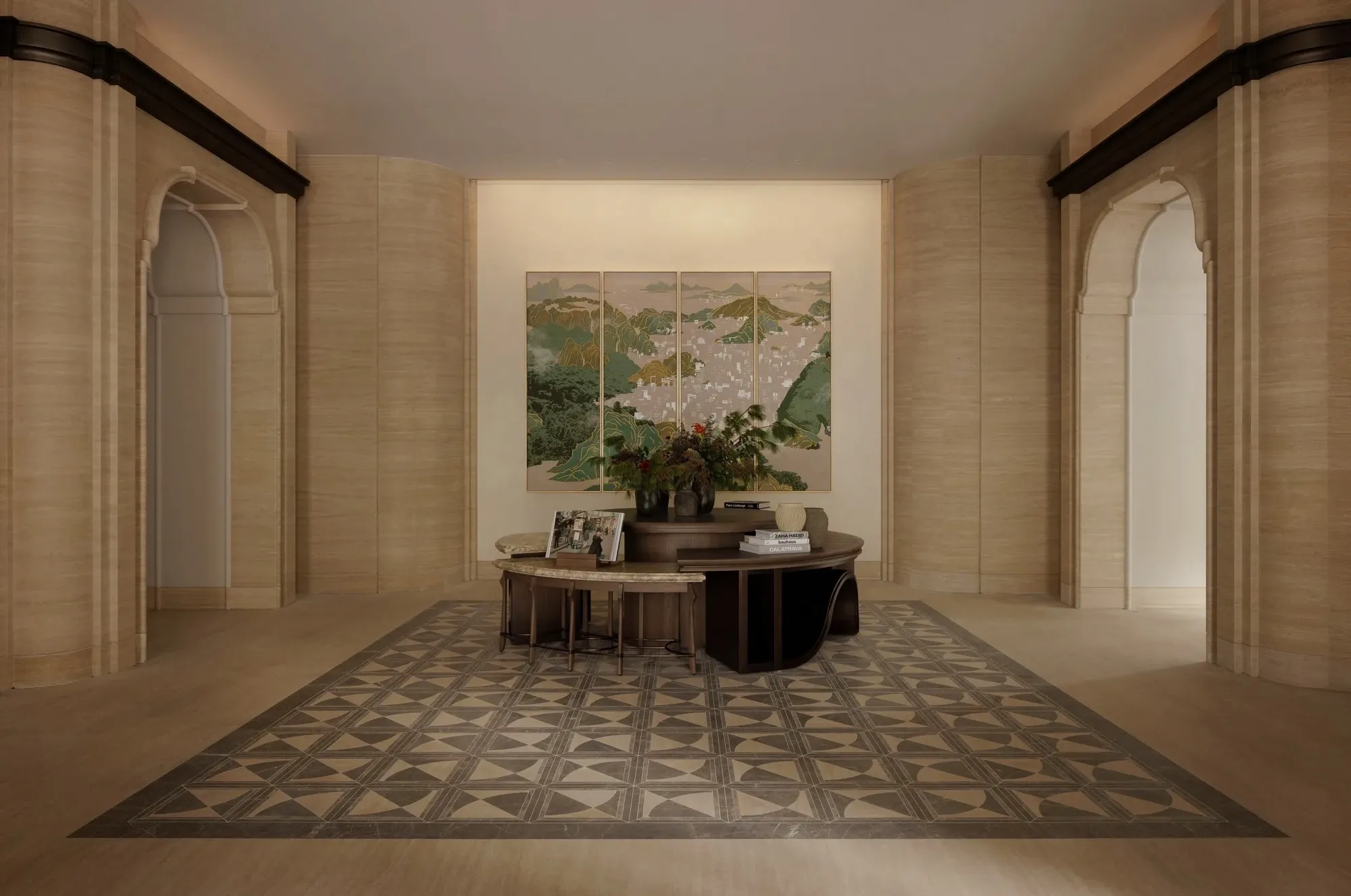A stone lobby with a large landscape painting above a round table